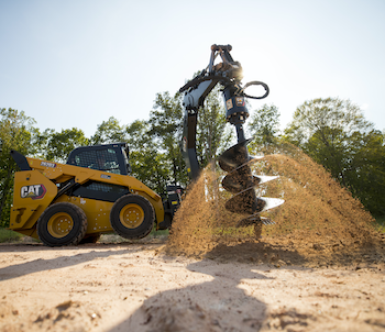 Cat Smart backhoe loader accommodates different powered attachments