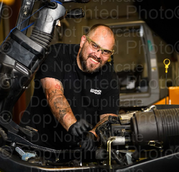 Equipment Depot technician on a Mitsubishi