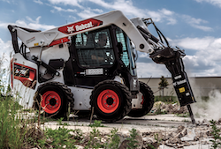Bobcat skid steer with hammer